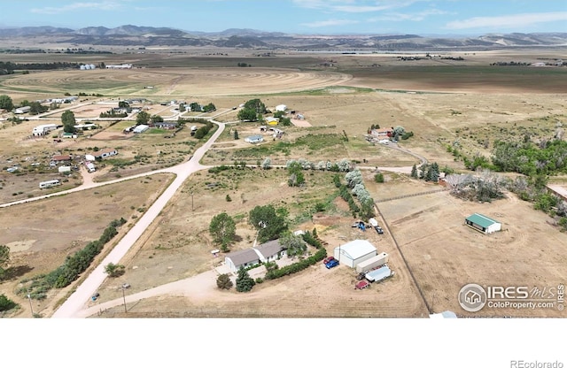 bird's eye view with a mountain view and a rural view