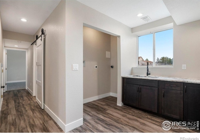 bathroom with wood-type flooring and vanity