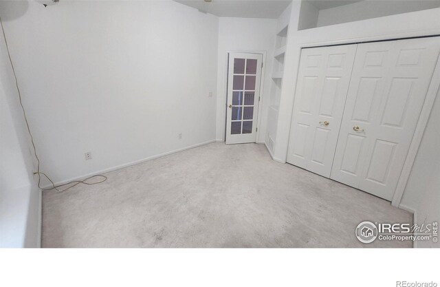 unfurnished bedroom featuring a closet