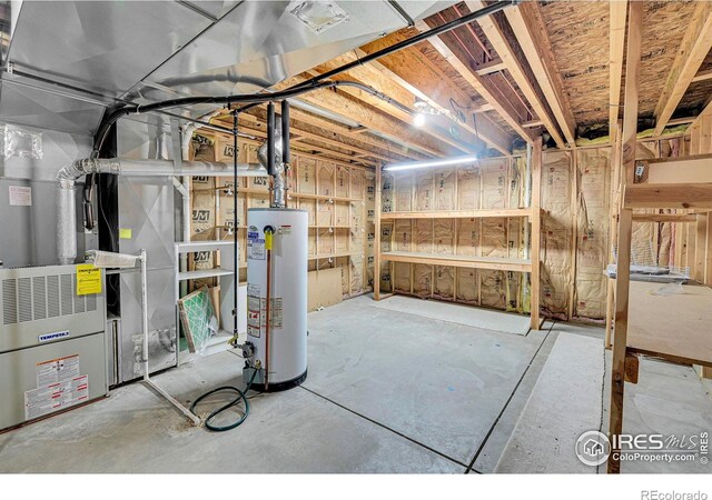 basement featuring water heater