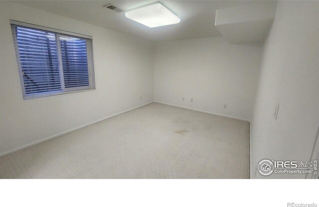 empty room with carpet floors