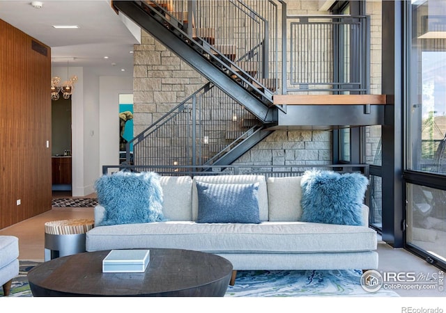 living room featuring wooden walls