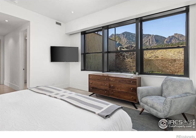 bedroom featuring wood-type flooring