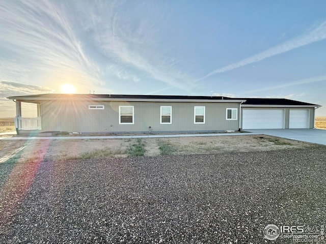 view of front of home with a garage and driveway
