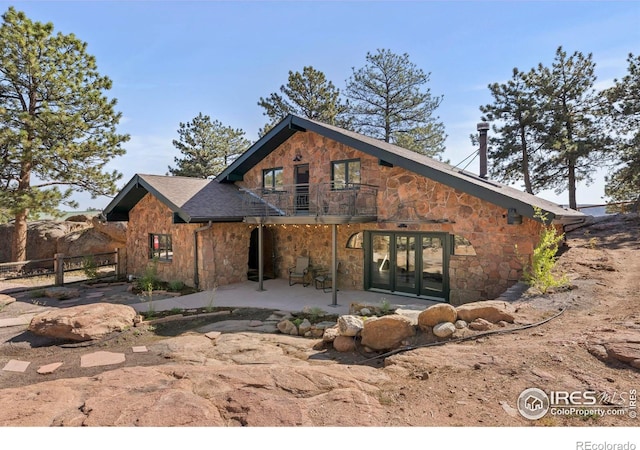 back of house featuring a patio area