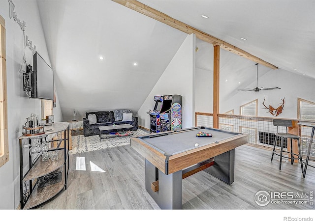 recreation room featuring ceiling fan, beamed ceiling, light hardwood / wood-style flooring, high vaulted ceiling, and pool table