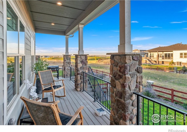 deck with covered porch