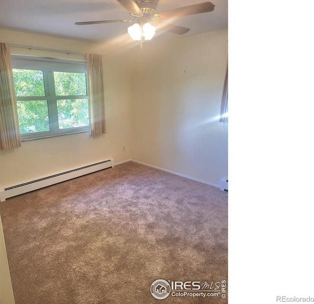 spare room with ceiling fan, a baseboard radiator, and carpet floors