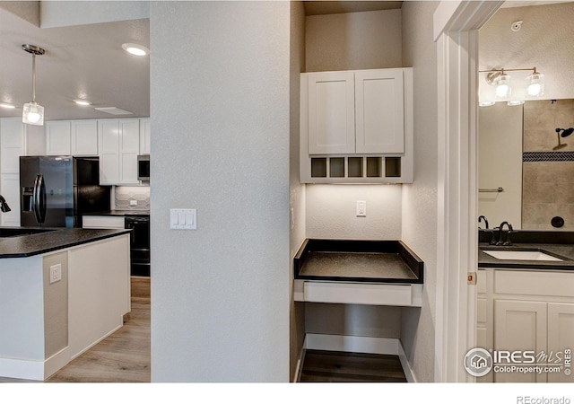 265 High Point Dr Unit 203, Longmont, CO 80504 - stairs featuring wood finished floors