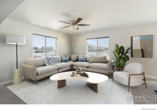 living room featuring hardwood / wood-style floors and ceiling fan