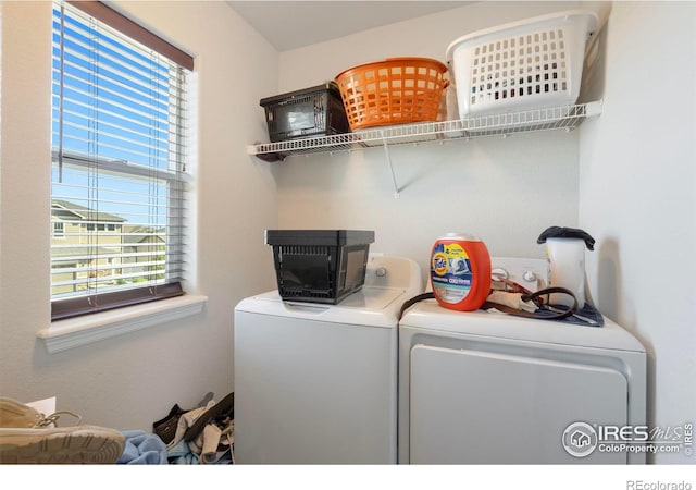 laundry room featuring separate washer and dryer