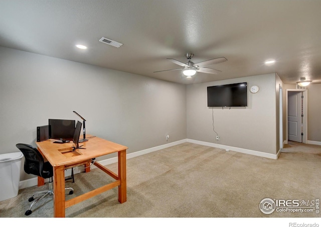 office featuring ceiling fan and light colored carpet