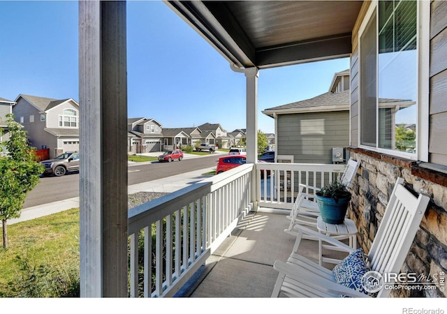 balcony featuring covered porch