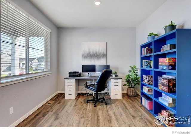 office with hardwood / wood-style floors