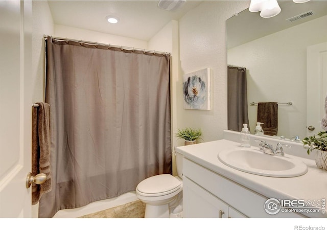 full bathroom with tile patterned flooring, vanity, toilet, and shower / bathtub combination with curtain