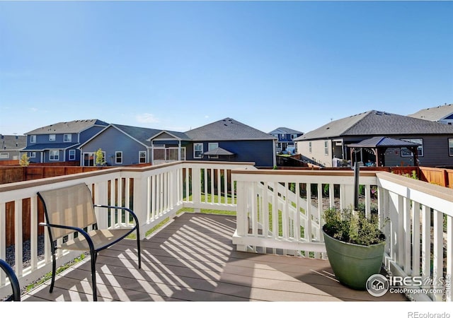 wooden deck with a gazebo