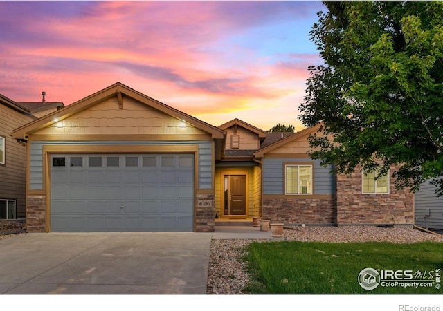 view of front of home with a garage