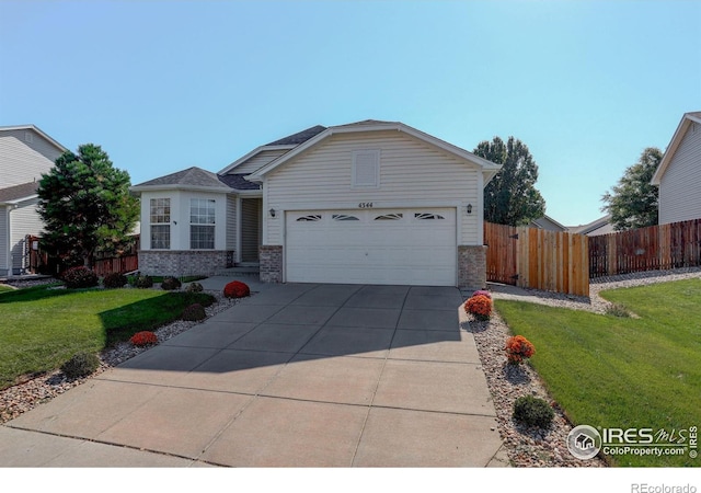 ranch-style house with a garage and a front yard