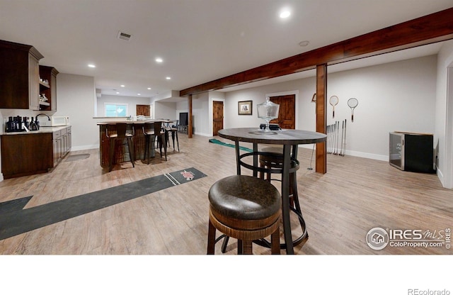 dining space featuring light hardwood / wood-style floors