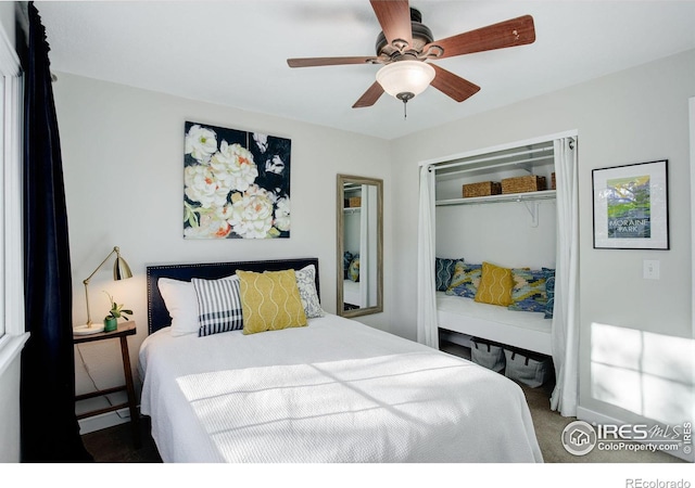 bedroom featuring carpet, ceiling fan, and a closet