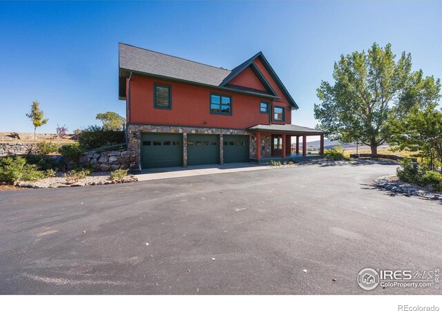 view of front of home with a garage