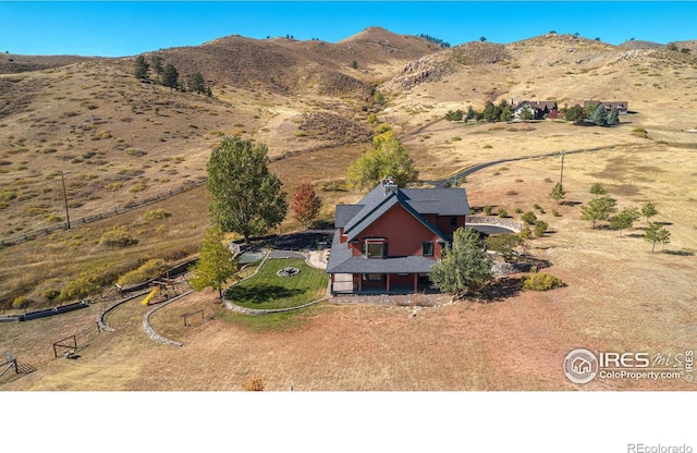 drone / aerial view with a rural view and a mountain view