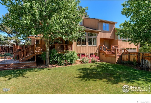 view of yard featuring a wooden deck