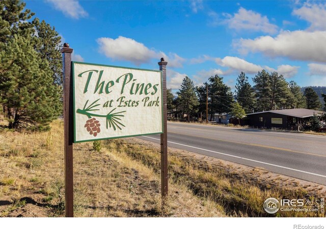 view of community sign