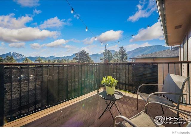 1155 S Saint Vrain Ave Unit U6, Estes Park, CO 80517 - wooden deck with a mountain view