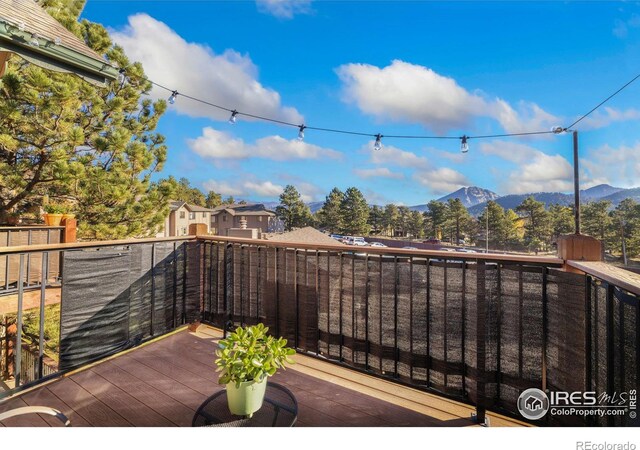 1155 S Saint Vrain Ave Unit U6, Estes Park, CO 80517 - view of patio featuring a mountain view and a balcony