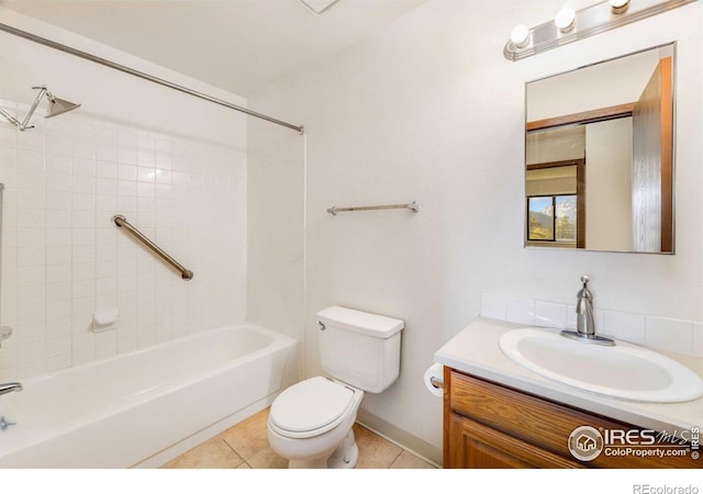 full bathroom featuring tile patterned floors, tiled shower / bath combo, vanity, and toilet