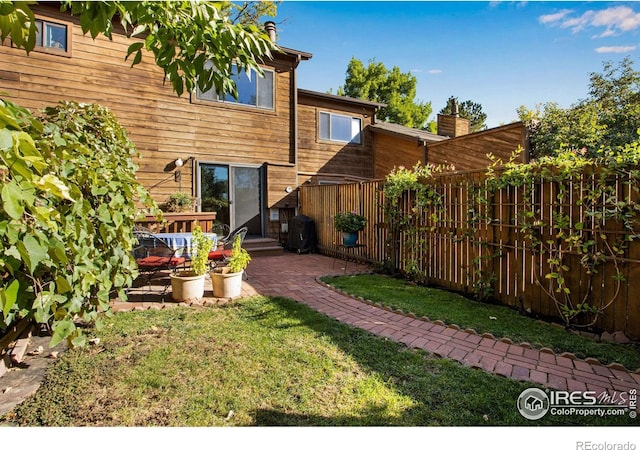 view of yard with a patio area