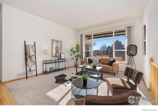 living room with light hardwood / wood-style flooring