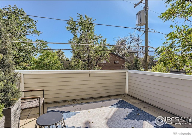 view of patio / terrace with a balcony