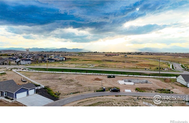 drone / aerial view featuring a mountain view