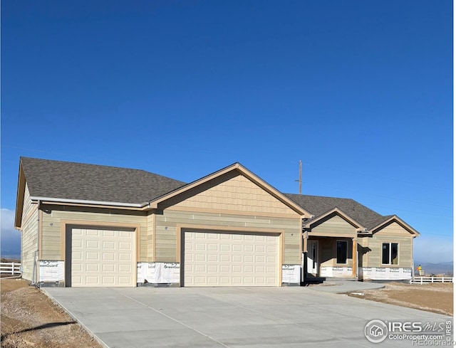 single story home with a garage