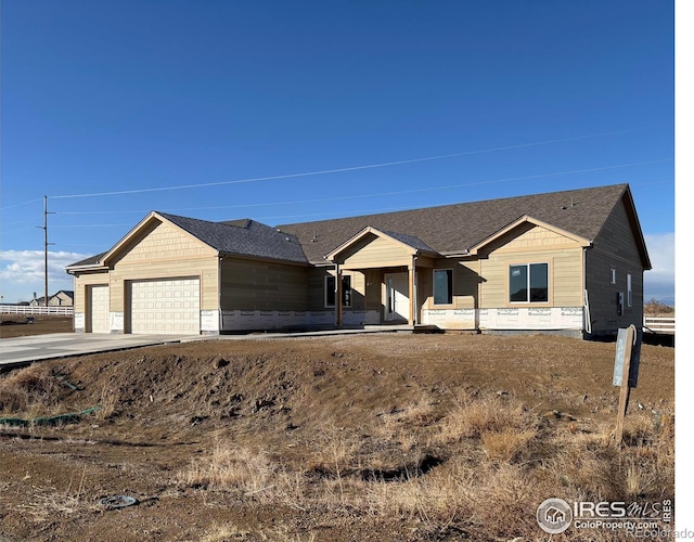 view of front of house with a garage