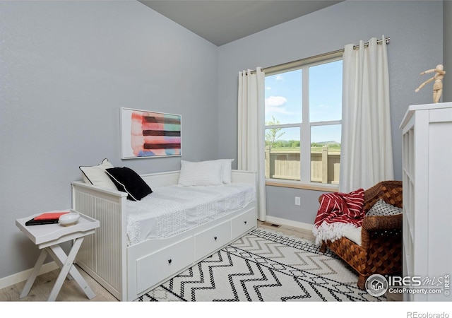 bedroom with light hardwood / wood-style flooring