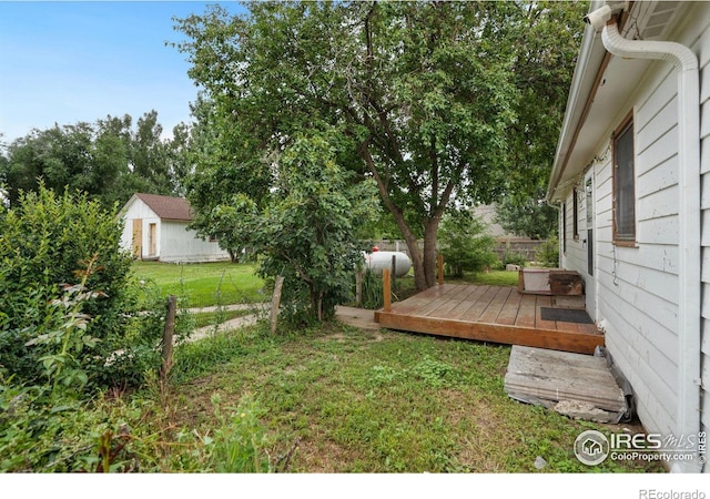 view of yard featuring a deck