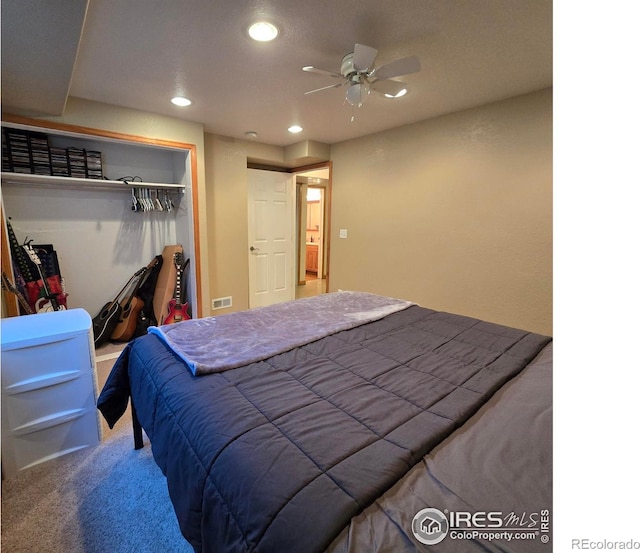 bedroom featuring a closet, ceiling fan, and carpet floors