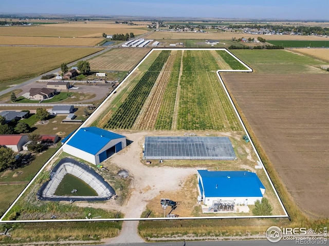 birds eye view of property featuring a rural view