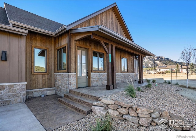 doorway to property featuring a mountain view