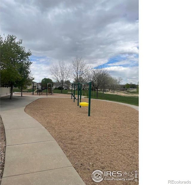 view of home's community with a playground