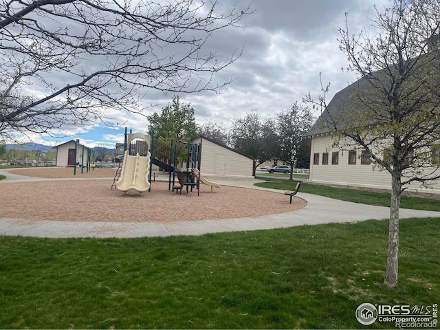 view of play area with a yard