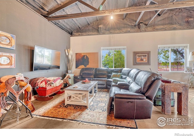 living room with wood ceiling, high vaulted ceiling, beam ceiling, and a healthy amount of sunlight