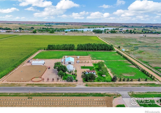 aerial view featuring a water view and a rural view