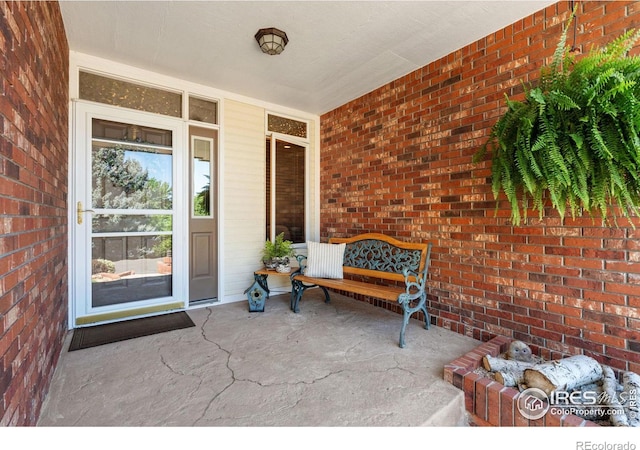 property entrance with covered porch