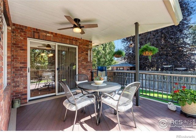 wooden deck with ceiling fan