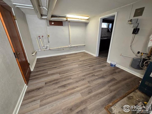 basement featuring wood-type flooring