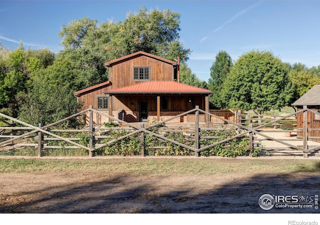 view of front facade with an outbuilding